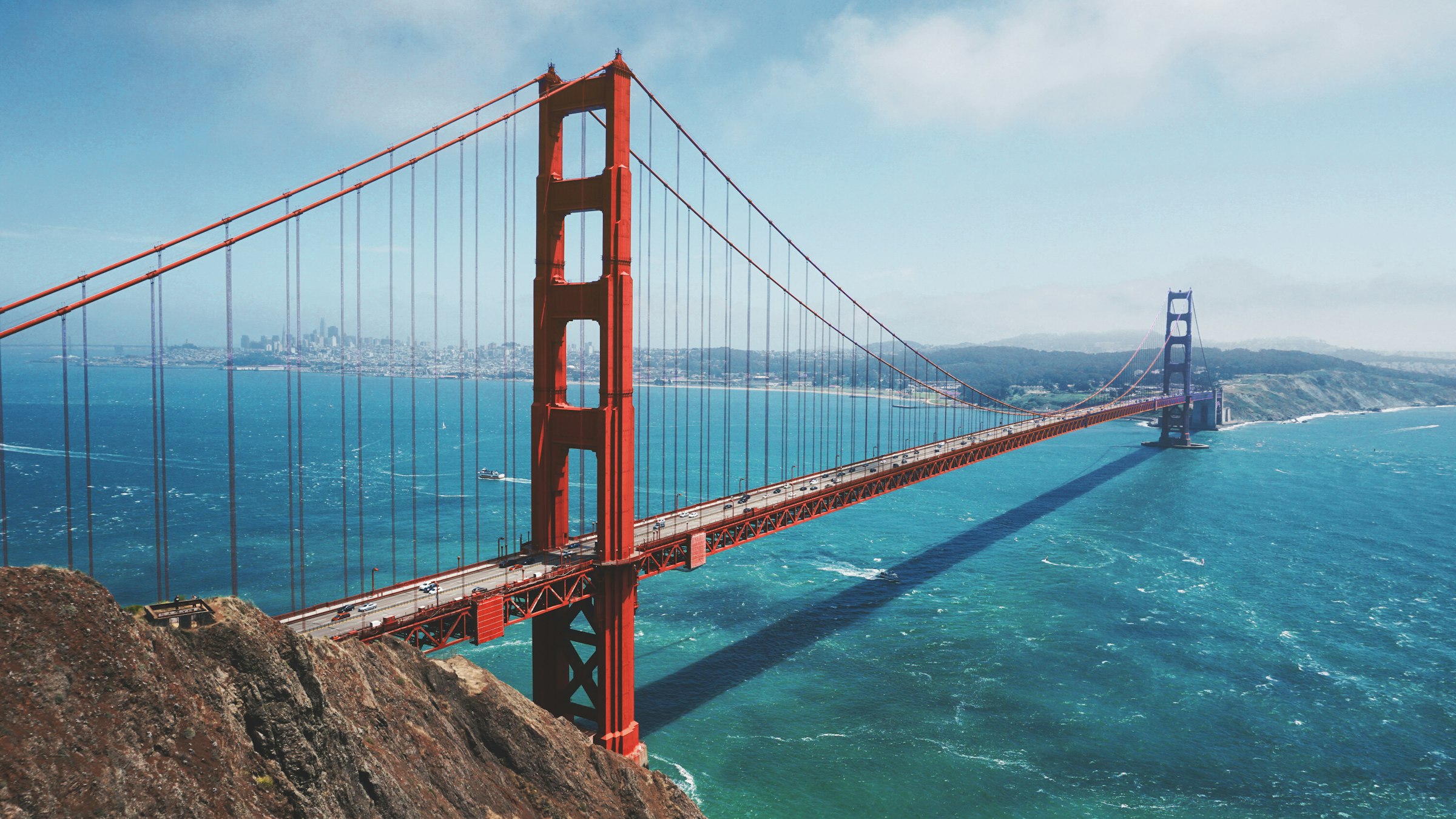 Suspension bridge spanning the bay — connecting systems and data